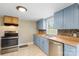 Functional kitchen equipped with modern appliances, wood countertops, and ample storage at 202 Glenn Ave, Kannapolis, NC 28081