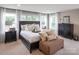Serene main bedroom with natural light, decorative pillows, and furniture at 236 Paradise Dr, Belmont, NC 28012