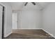 This bedroom features luxury vinyl plank flooring and a double door closet at 240 Swink Ave, Salisbury, NC 28147