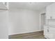 Bright kitchen with tile backsplash, granite counters, and modern hardware and finishes at 240 Swink Ave, Salisbury, NC 28147