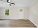Bright living room with neutral paint, modern floors, a ceiling fan and lots of natural light at 240 Swink Ave, Salisbury, NC 28147
