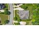 Aerial view of the home showcases its roof, driveway, walkway, and verdant landscaping at 2501 Christenbury Hall Nw Ct, Concord, NC 28027