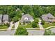 Beautiful aerial view showcasing the well-manicured front lawn and inviting curb appeal of this charming home at 2501 Christenbury Hall Nw Ct, Concord, NC 28027