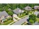 Stunning aerial view of a well-maintained home with lush landscaping and a charming neighborhood setting at 2501 Christenbury Hall Nw Ct, Concord, NC 28027