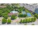 A bird's-eye view reveals the clubhouse, pool, tennis court, and basketball court amenities available in this vibrant community at 2501 Christenbury Hall Nw Ct, Concord, NC 28027