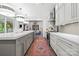 Bright modern kitchen with a spacious island, and an open layout into the dining area at 2501 Christenbury Hall Nw Ct, Concord, NC 28027