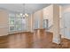Elegant foyer with soaring ceilings, hardwood floors, and a grand staircase, creating a lasting first impression at 2504 Fallbrook Pl, Concord, NC 28027