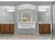 Luxurious main bathroom with dual sinks, soaking tub, and elegant finishes at 2504 Fallbrook Pl, Concord, NC 28027