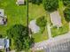 An aerial view of the home shows the layout of the house, driveway, street, and surrounding green lawn and mature trees at 2519 2Nd Sw Ave, Hickory, NC 28602
