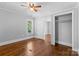 Bedroom with hardwood floors, ceiling fan, window and closet at 2519 2Nd Sw Ave, Hickory, NC 28602