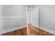 Bedroom with hardwood floors and a white door at 2519 2Nd Sw Ave, Hickory, NC 28602