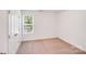 Bedroom with a window and a closet at 2612 Cold Springs Rd, Concord, NC 28025
