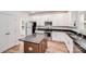 Stylish kitchen with stainless steel appliances, granite countertops, and a functional island at 2612 Cold Springs Rd, Concord, NC 28025
