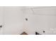 This is a laundry room with light walls, a shelf, and hook ups for a washer and dryer at 2612 Cold Springs Rd, Concord, NC 28025