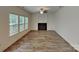 Spacious living room featuring wood floors, fireplace and plenty of natural light at 2612 Cold Springs Rd, Concord, NC 28025