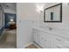 Bright bathroom features a white vanity and classic white tiled walls at 2917 Rustic Ln, Charlotte, NC 28210