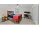 Cozy bedroom with a wood frame bed, a window, and space for a desk setup at 2917 Rustic Ln, Charlotte, NC 28210