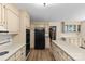 Eat-in kitchen with stainless steel appliances, and wood floors at 2917 Rustic Ln, Charlotte, NC 28210