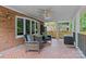 Covered patio with comfortable seating perfect for outdoor relaxation at 2917 Rustic Ln, Charlotte, NC 28210