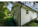 Exterior shot showing white siding and window of a house at 307 Elm St, Belmont, NC 28012