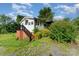 Charming home with brick foundation and black porch railing at 307 Elm St, Belmont, NC 28012