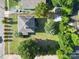 Aerial view of a property with a well-maintained yard and surrounding neighborhood at 309 S Greene St, Wadesboro, NC 28170