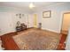 A bright and airy bedroom featuring hardwood floors and classic architectural details at 309 S Greene St, Wadesboro, NC 28170