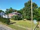 Charming two-story brick home with a well-manicured lawn and mature trees in a desirable neighborhood at 309 S Greene St, Wadesboro, NC 28170