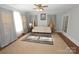 Inviting living room with comfortable seating, area rug, and soft natural light at 309 S Greene St, Wadesboro, NC 28170