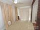 Light-filled sunroom featuring neutral tones and plenty of natural light at 309 S Greene St, Wadesboro, NC 28170