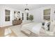 Bedroom with a modern chandelier, windows, and stylish decor at 3119 Shenandoah Ave, Charlotte, NC 28205
