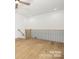 An airy loft space featuring hardwood floors, metal railing, and natural light at 3119 Shenandoah Ave, Charlotte, NC 28205