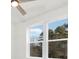 Double windows provide an abundance of natural light and views of the surrounding forest at 3119 Shenandoah Ave, Charlotte, NC 28205