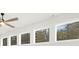 Large windows offer natural light and serene views of the surrounding trees and sky at 3119 Shenandoah Ave, Charlotte, NC 28205