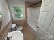 Bathroom featuring a bathtub and window view at 322 Buffalo St, Shelby, NC 28150