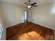 Inviting bedroom featuring gleaming hardwood floors and fresh paint at 322 Buffalo St, Shelby, NC 28150