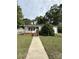 Charming single-story home features a tidy front yard, a welcoming porch, and a classic white exterior at 322 Buffalo St, Shelby, NC 28150