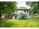 Expansive backyard featuring a wooden deck and lush green lawn, perfect for outdoor enjoyment at 3221 5Th Street Nw Ct, Hickory, NC 28601