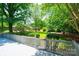 Backyard deck with backyard views and access through a gated staircase at 3221 5Th Street Nw Ct, Hickory, NC 28601
