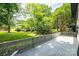 Backyard deck overlooks a lush and manicured green space at 3221 5Th Street Nw Ct, Hickory, NC 28601