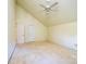 Spacious bedroom featuring a vaulted ceiling and a ceiling fan with light fixture at 3221 5Th Street Nw Ct, Hickory, NC 28601