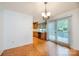 Dining area features a sliding glass door to the deck and adjoins the kitchen area at 3221 5Th Street Nw Ct, Hickory, NC 28601