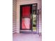 Close-up of a red front door with sidelight, showing a welcoming entrance to the home at 3221 5Th Street Nw Ct, Hickory, NC 28601