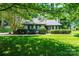 Charming home with a well-manicured lawn and mature landscaping, offering great curb appeal at 3221 5Th Street Nw Ct, Hickory, NC 28601