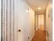 A well-lit hallway with multiple doors and wall paper at 3221 5Th Street Nw Ct, Hickory, NC 28601