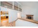 Bright and open living space featuring a stone fireplace and an open staircase at 3221 5Th Street Nw Ct, Hickory, NC 28601