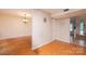 A bright and sunny living room showcasing the flooring and neutral walls at 3221 5Th Street Nw Ct, Hickory, NC 28601