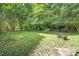 Wide backyard featuring trees and grassy lawn at 3230 Kingsfield Rd, Rock Hill, SC 29732