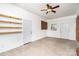 Spacious carpeted bedroom features a ceiling fan and built-in shelving at 3230 Kingsfield Rd, Rock Hill, SC 29732