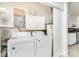 Functional laundry room with washer, dryer, and additional storage cabinets at 3230 Kingsfield Rd, Rock Hill, SC 29732